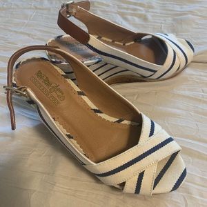 Coach wedges.